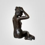 Woman putting up her hair Inke Zeegelaar sculptures